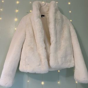 White faux fur coat